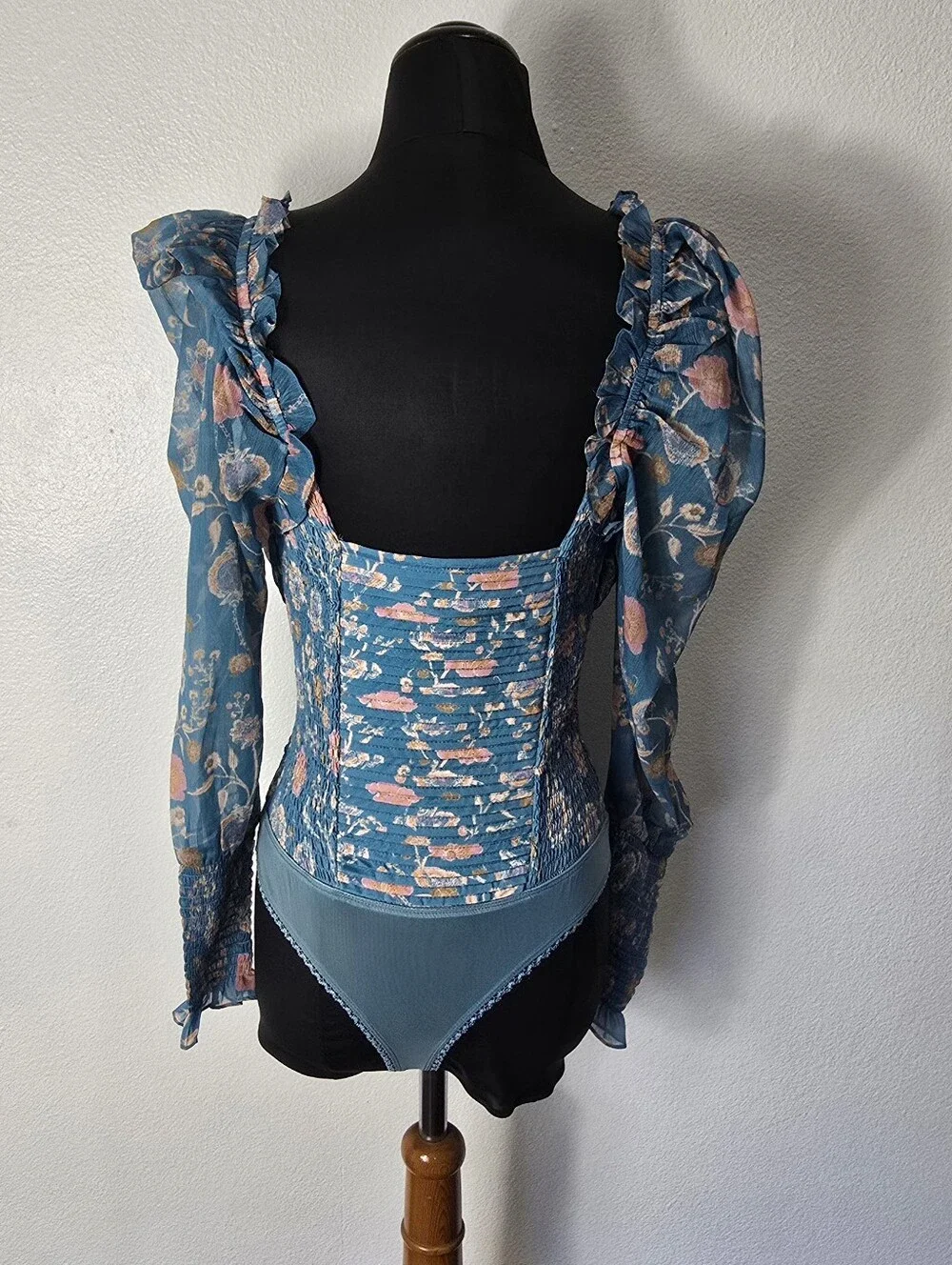 Free People Turquoise Floral Smocked  Long Sleeve Bodysuit.